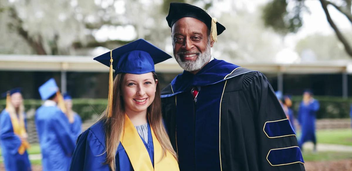 Student and teacher on graduation ceremony